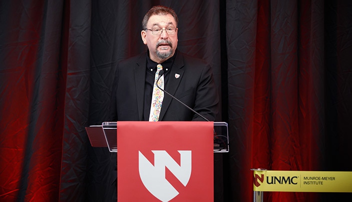 Karoly Mirnics, MD, PhD, speaks at the dedication of the new building on June 8.