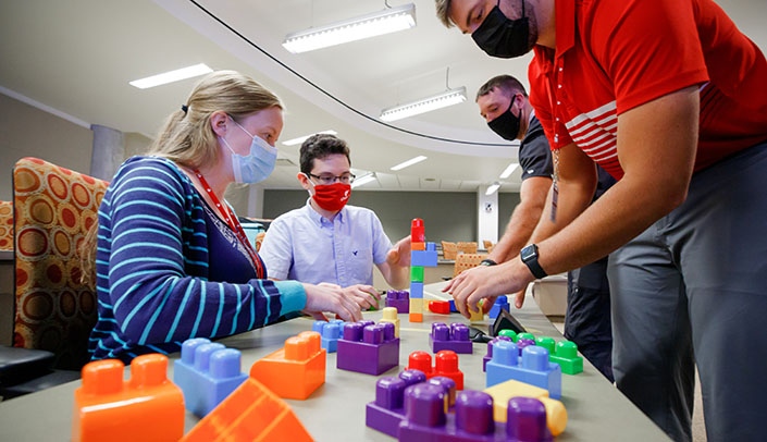 From left, students Emily Leahy, Andrew Olvera, Zackary Baker and Matt Pile take part in IPE Day.