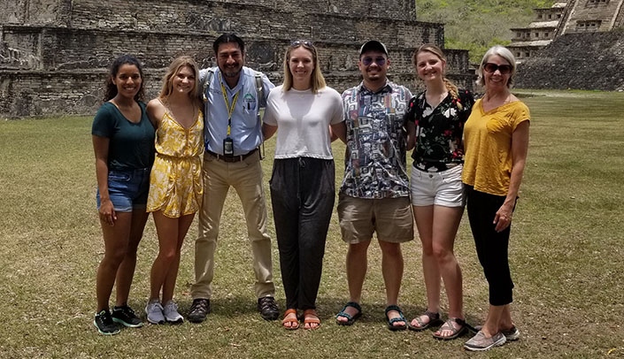 Sara Pirtle, at right, with a tour guide (third from left) and students in Xalapa in 2019.