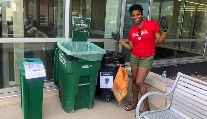 At the all-campus barbecue, volunteers stood at each waste station and helped students and staff sort their waste into the correct bin.