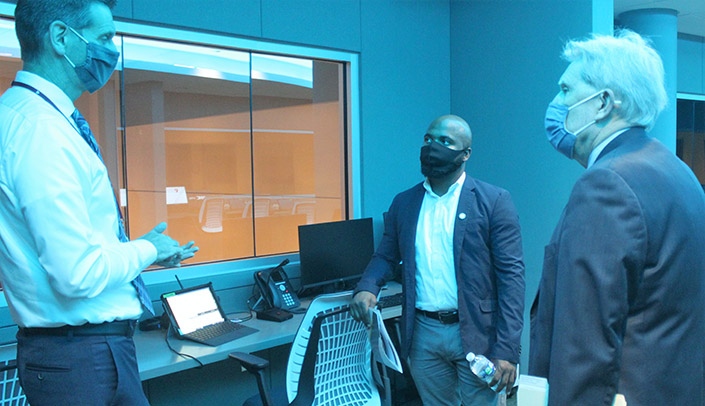 Nebraska State Sen. Terrell McKinney, center, tours the Davis Global Center during a recent visit to UNMC.