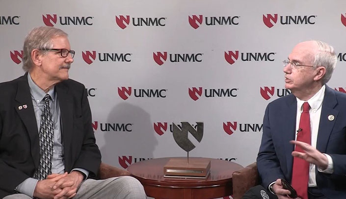 From left, Steve Wengel, MD, and UNMC Chancellor Jeffrey P. Gold, MD, discuss strategies for dealing with stress.