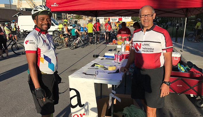 From left, Shelton Sisimai, systems senior analyst, in Nebraska Medicine Radiation Oncology, and UNMC's Peter Pellerito at the Corporate Cycling Challenge.