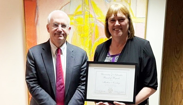 From left, UNMC Chancellor Jeffrey P. Gold, MD, and Marlene Novotny at the October Board of Regents meeting.