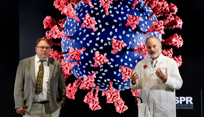 James Lawler, MD, co-executive director of the UNMC Global Center for Health Security, right, and Peter Angeletti, PhD, virologist and associate professor at the University of Nebraska-Lincoln Nebraska Center for Virology, speak Monday about the omicron variant and COVID-19 safety measures.