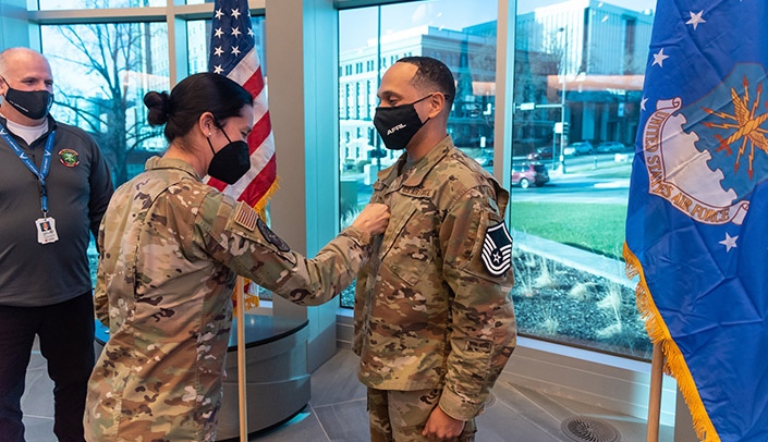 Lt. Col. Elizabeth Schnaubelt, MD, and newly promoted Master Sgt. Victor Kipping