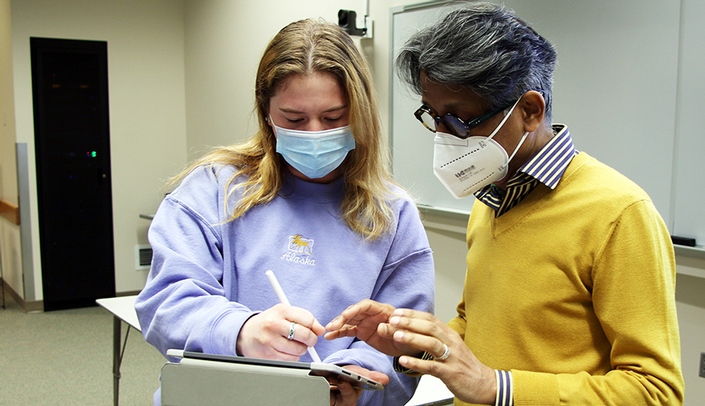 Ali Nawshad (right), PhD, professor in the department of oral biology at the UNMC College of Dentistry