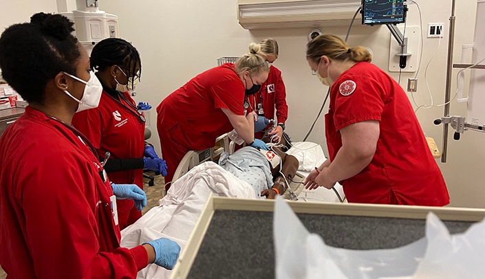 Nursing students participate in simulation training.