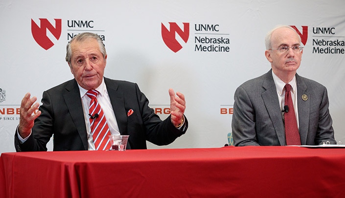 Gary Player and UNMC Chancellor Jeffrey P. Gold, MD, speak at Tuesday's press conference.