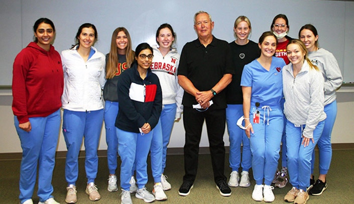 Kenneth L. Kalkwarf, DDS, MS, with UNMC College of Dentistry students.