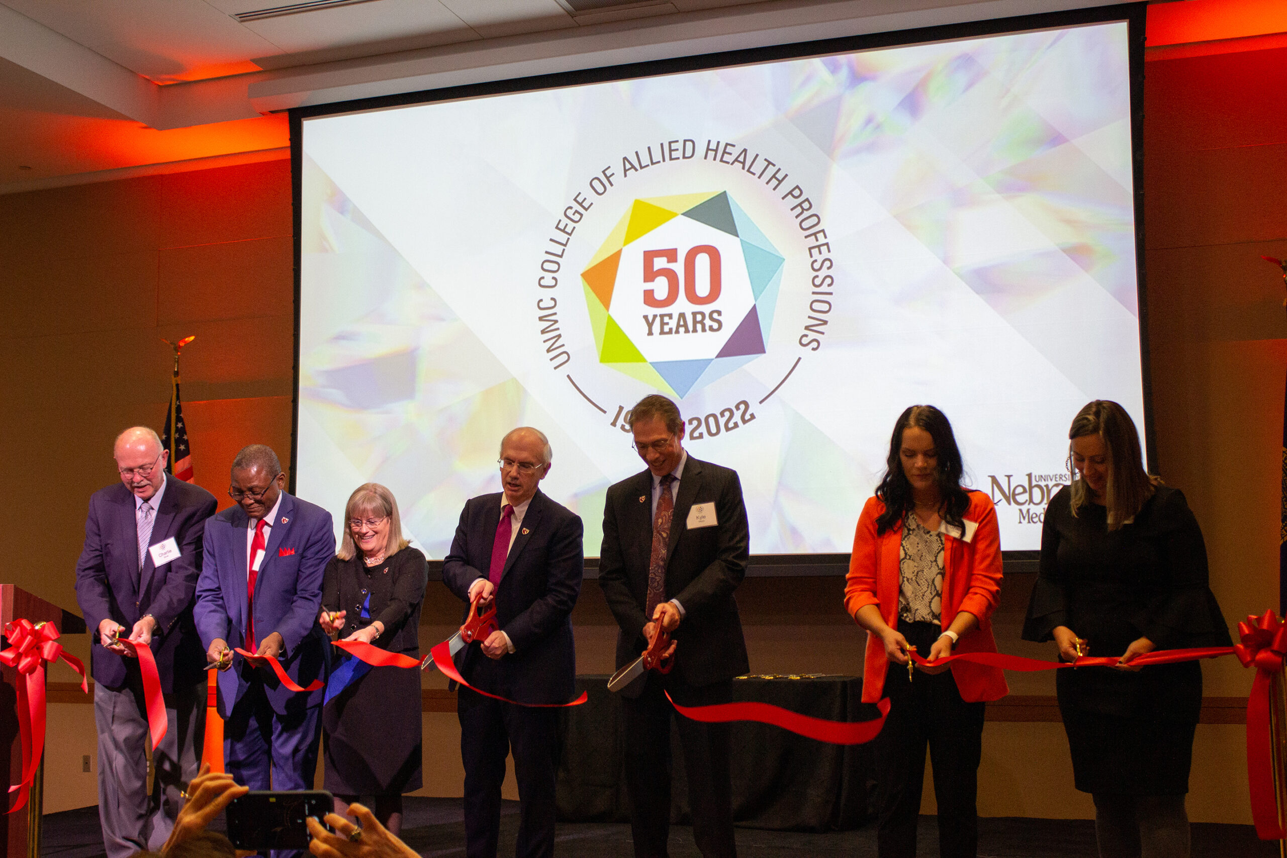 Dignitaries from UNMC and the College of Allied Health Professions cut the ribbon on the future of the college at its 50th Anniversary Gala on Sept 22&period;