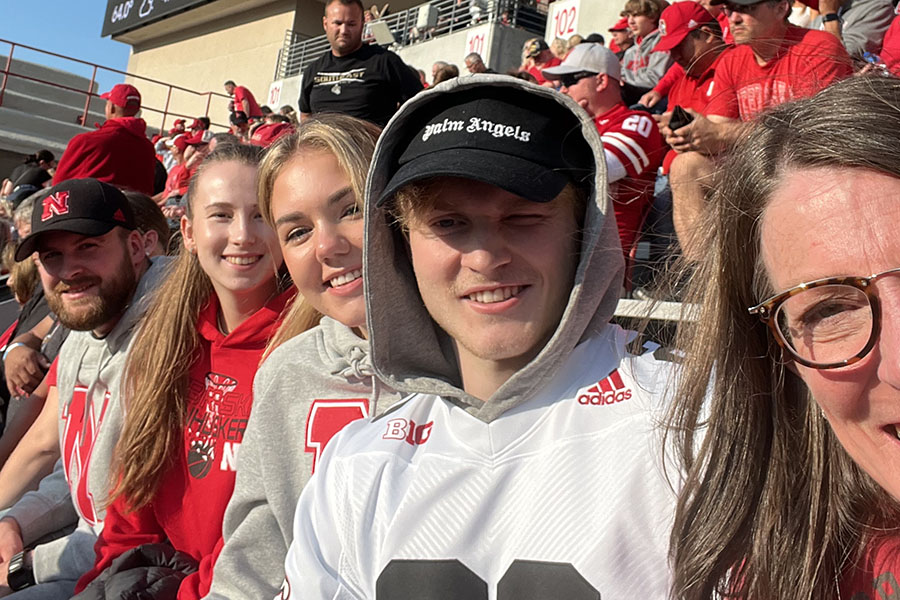 Exchange students attend a Nebraska Cornhusker football game&period;