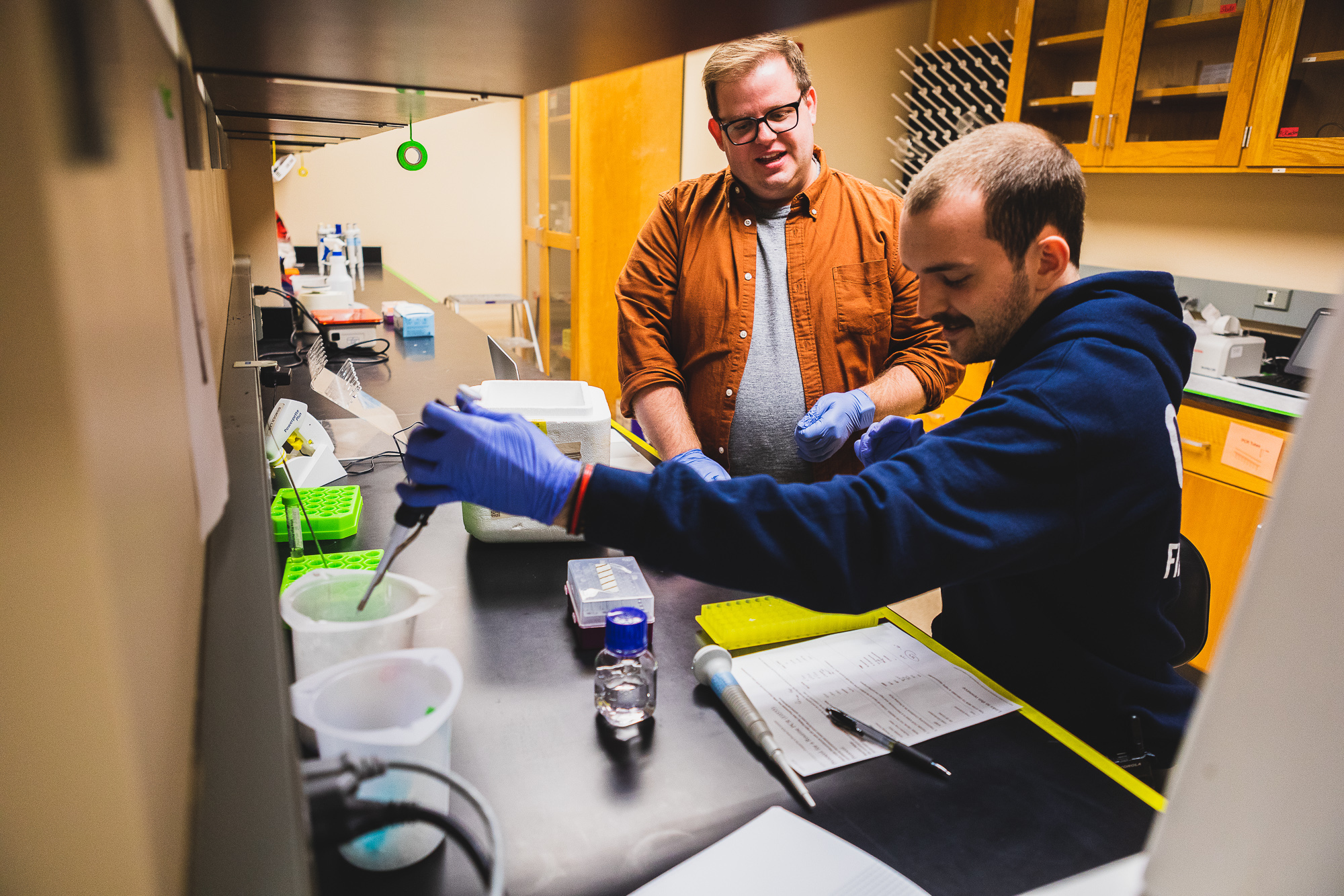 Dane Bowder&comma; PhD&comma; at left&comma; is joined by senior biology major&comma; Sean Hummel