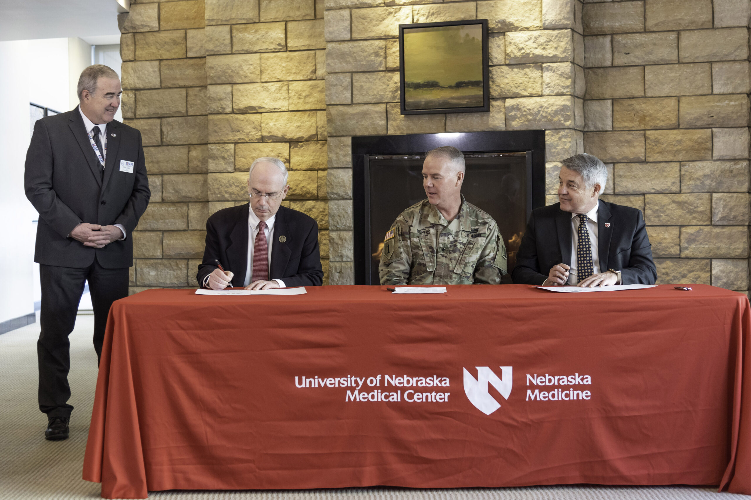 From left&comma; Maj&period; Gen&period; &lpar;Ret&period;&rpar; Rick Evans&comma; executive director of the National Strategic Research Institute and state chairman of the Nebraska ESGR committee&semi; UNMC Chancellor Jeffrey P&period; Gold&comma; MD&semi; Brig&period; Gen&period; Gary Ropers&comma; land component commander&comma; Nebraska Army National Guard&semi; and James Linder&comma; MD&comma; CEO of Nebraska Medicine at the signing event Feb&period; 3&period;