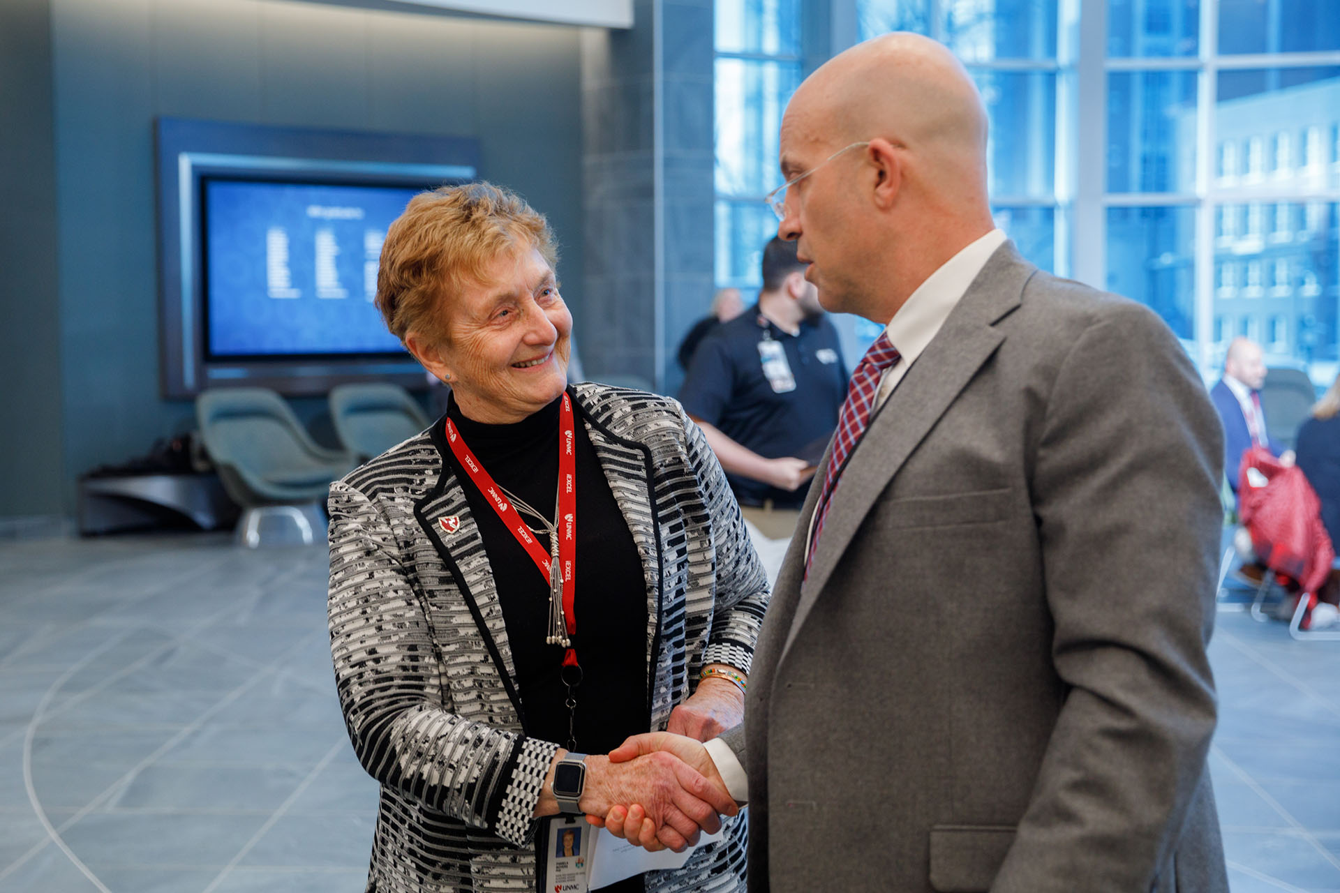 Pamela Boyers&comma; PhD&comma; associate vice chancellor for clinical simulation&comma; congratulates William Thorell&comma; MD&comma; winner of the Impact Award from iEXCEL&period;