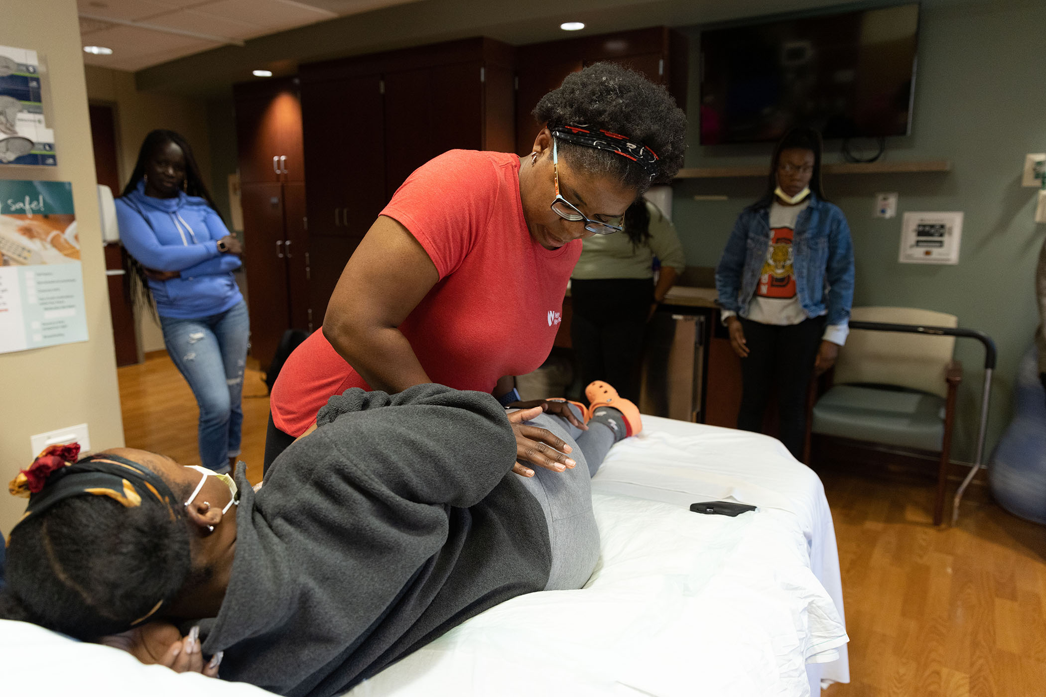 While doulas-in-training toured the labor and delivery unit&comma; Jessica McGhee demonstrates an exercise doulas can perform to relieve labor pains&period;