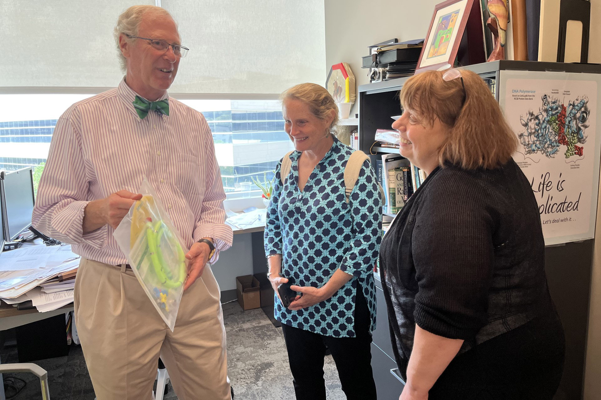 From left&comma; Maurice Godfrey&comma; PhD&comma; visits with Rita Devine&comma; PhD&comma; assistant director for science administration in the division of intramural research at the National Institutes of Health&comma; and Nancy Bowen&comma; DrPH&comma; with the office of the scientific director for the National Institute of Neurological Disorders and Stroke at the NIH&period;