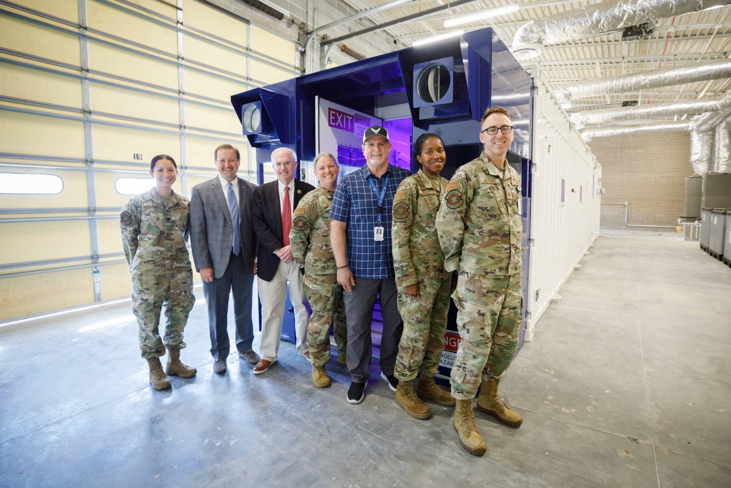 The Negatively Pressurized Conex training unit will be housed in the Infectious Diseases Air Transport Training Facility when the facility is completed&period; From left&comma; Lt&period; Col&period; Elizabeth Schnaubelt&comma; MD&comma; Chris Kratochvil&comma; MD&comma; UNMC Chancellor Jeffrey P&period; Gold&comma; MD&comma; Maj&period; Tiffany Welsh&comma; Bob Valentine&comma; Maj&period; Felecia Craddieth&comma; Maj&period; John McClain&comma; MD&period;