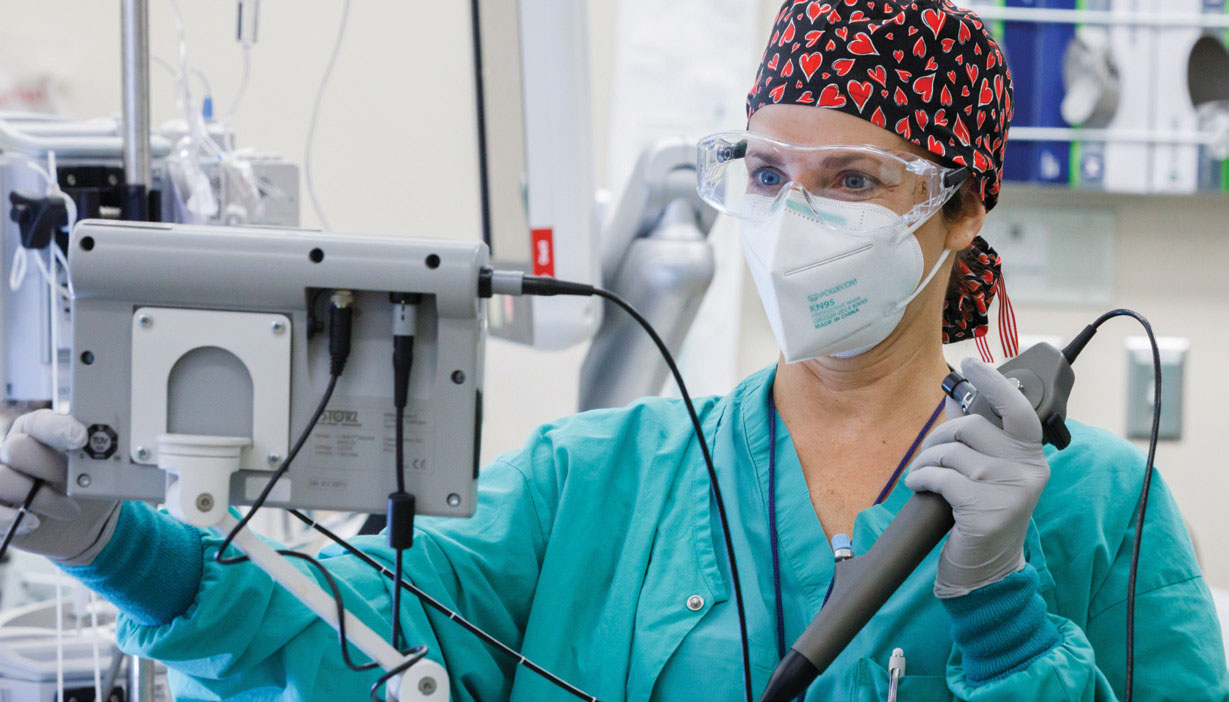 Amy Duhachek-Stapelman&comma; MD&period; vice chair of education for the UNMC Department of Anesthesiology&comma; work in the operating room at the Hixson-Lied Center&period;