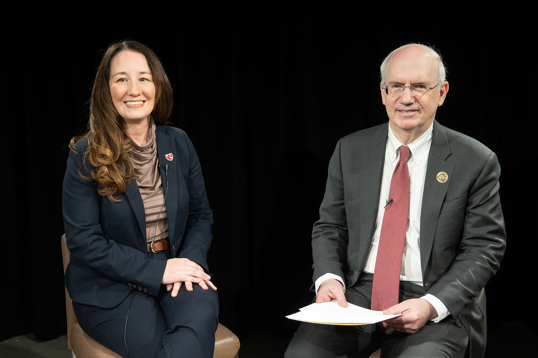 Windy Alonso&comma; PhD&comma; assistant professor in the UNMC College of Nursing&comma; and UNMC Chancellor Jeffrey P&period; Gold&comma; MD