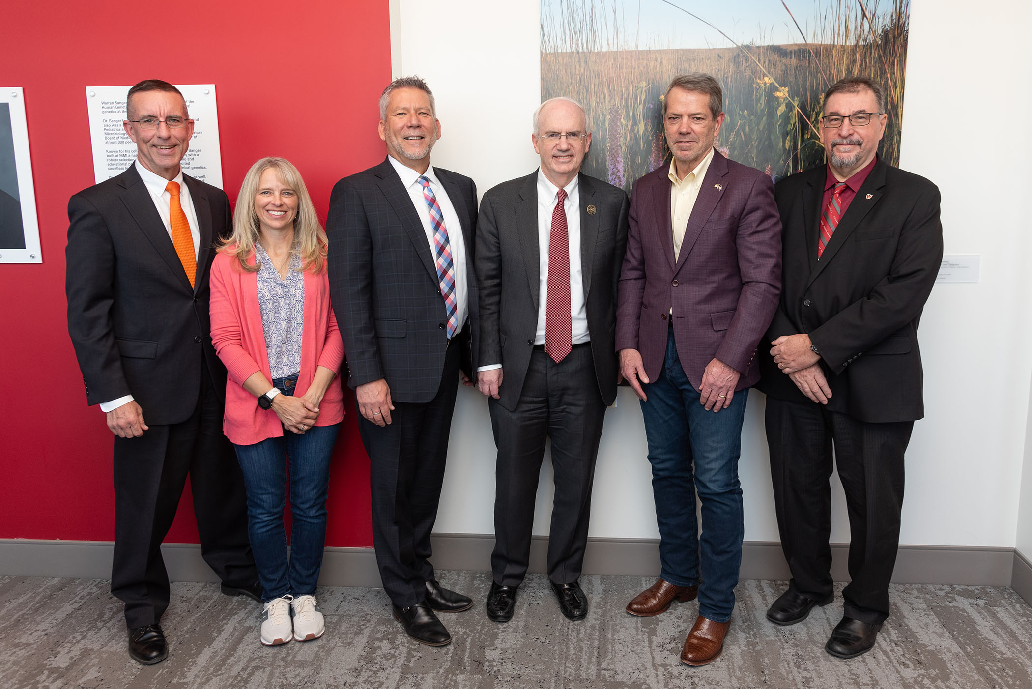 From left&comma; Steve Corsi&comma; PsyD&comma; CEO of Nebraska Department of Health and Human Services&semi; Rachelle Main&comma; a parent receiving support through the Family Support Waiver program&semi; Tony Green&comma; director of the DHHS Division of Developmental Disabilities&semi; Jeffrey P&period; Gold&comma; MD&comma; UNMC chancellor&semi; Gov&period; Jim Pillen&semi; and Karoly Mirnics&comma; MD&comma; PhD&comma; director of the Munroe-Meyer Institute