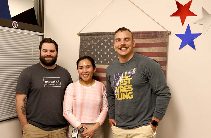 Recent graduates Ryan McManus&comma; United States Army&semi; Aprille Proctor&comma; United States Air Force&semi; and Manning Kuboushek&comma; United States Air Force&comma; stand in one of two rooms in the UNMC College of Nursing building dedicated to active duty and veteran students&period;