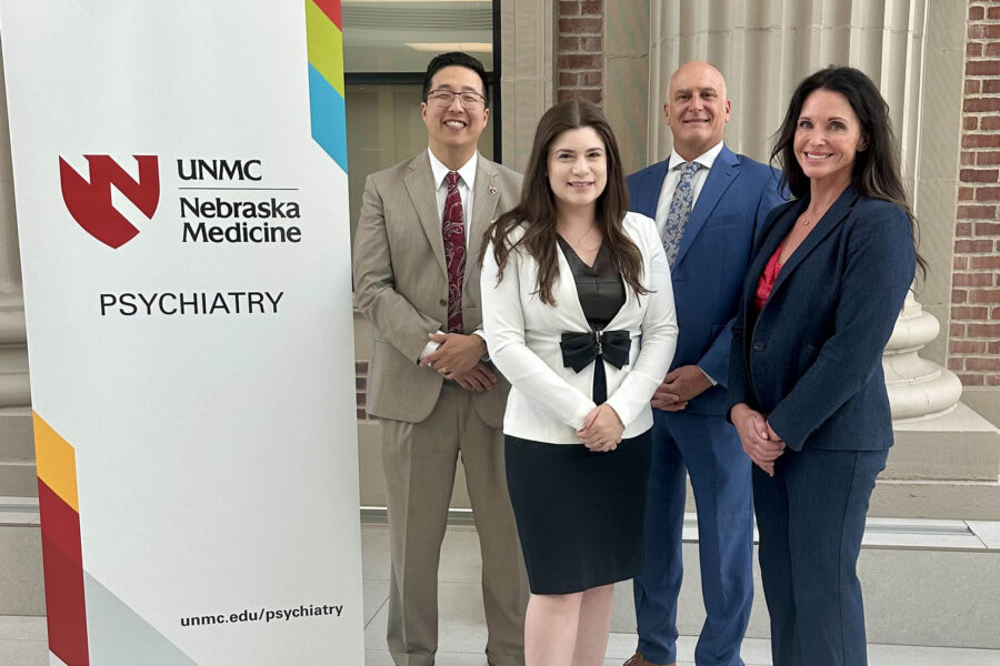 From left, Howard Liu, MD, chair of the UNMC Department of Psychiatry; Kimberly Clawson, MD, founding forensic psychiatry fellowship director, UNMC Department of Psychiatry; Tom Dargy, Sarpy County assistant county administrator; and Jo Martin, Sarpy County corrections director