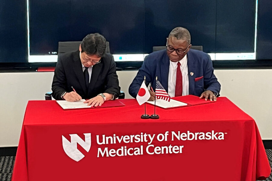 UNMC Interim Chancellor H. Dele Davies, MD, signed the Memorandum of Understanding with Norio Ohmagari, MD, PhD, of the Japan Institute for Health Security.