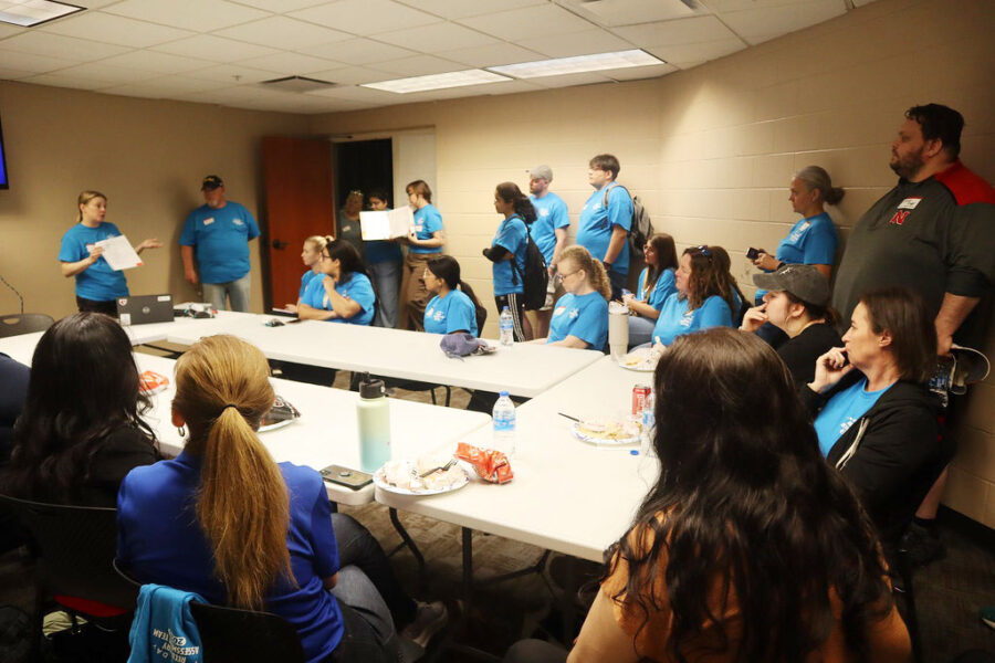 Kristina Kintziger, PhD, speaks with volunteers involved in the May survey of Douglas and Washington County communities impacted by the 2024 Arbor Day tornado outbreak.