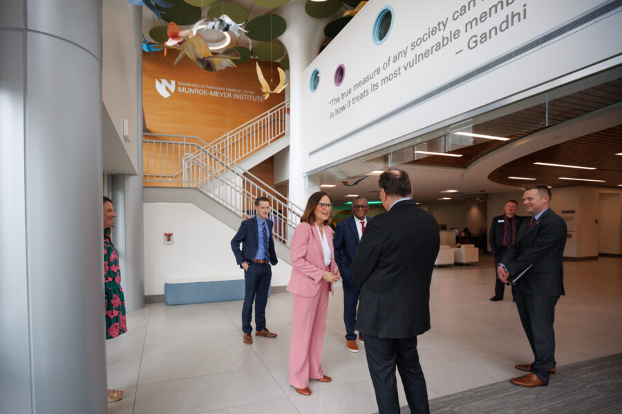 U.S. Sen. Deb Fischer chats with Karoly Mirnics, MD, PhD, dean and director of the Munroe-Meyer Institute, during a July visit.