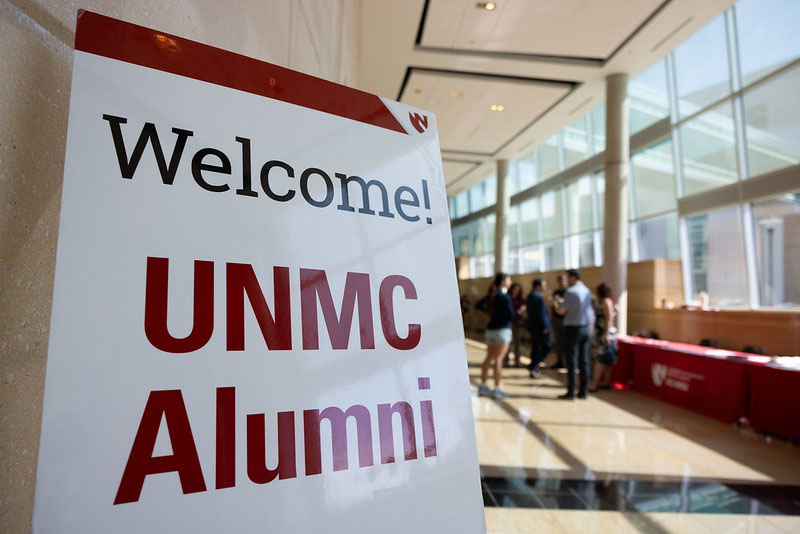 Sign reading "Welcome Alumni"