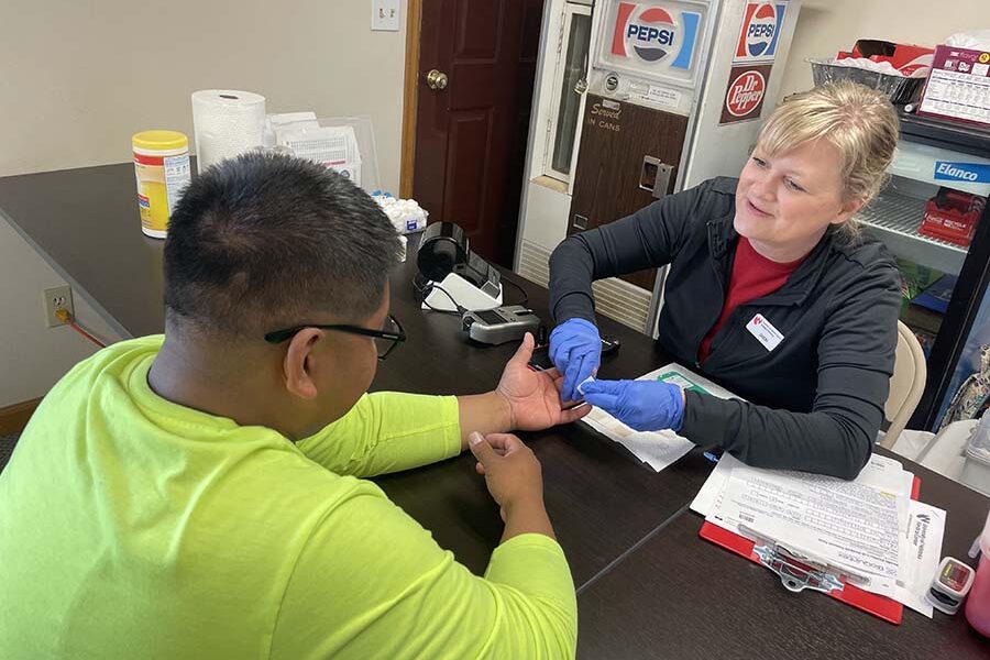 Sheri Rowland, DNP, provides an assessment as part of a study that measures the health of feedyard workers in the region.