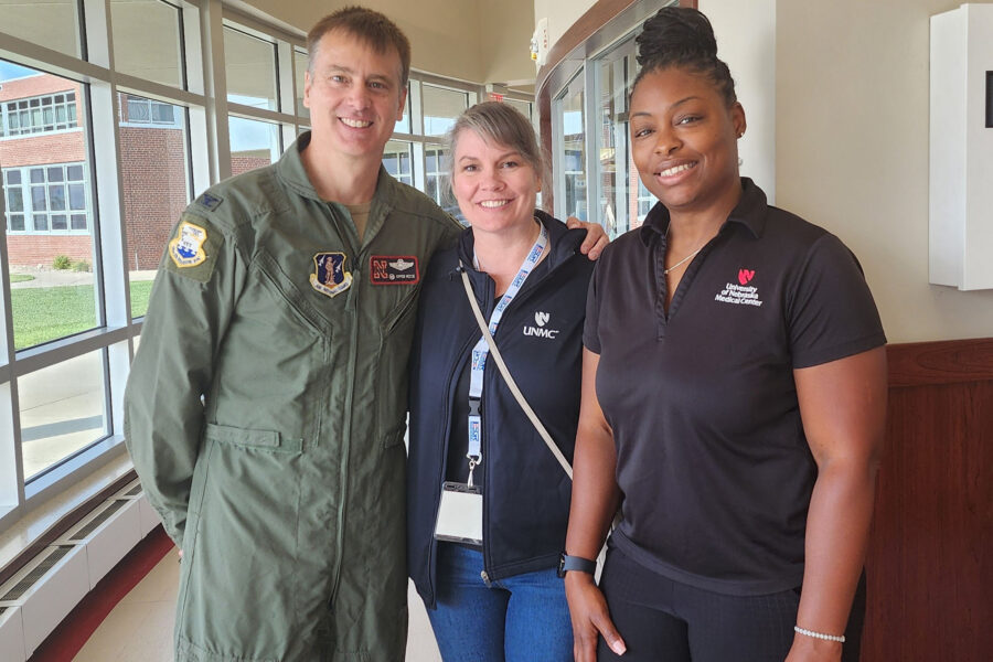 From left&comma; Col&period; Kipper Hesse&comma; wing commander of the 155th Air Refueling Wing&comma; Nebraska Air National Guard&comma; poses with Maggie Winnicki and Perris Scott&comma; of the UNMC College of Allied Health Professions&period; Scott also serves as a first sergeant in the Nebraska Air National Guard&period;