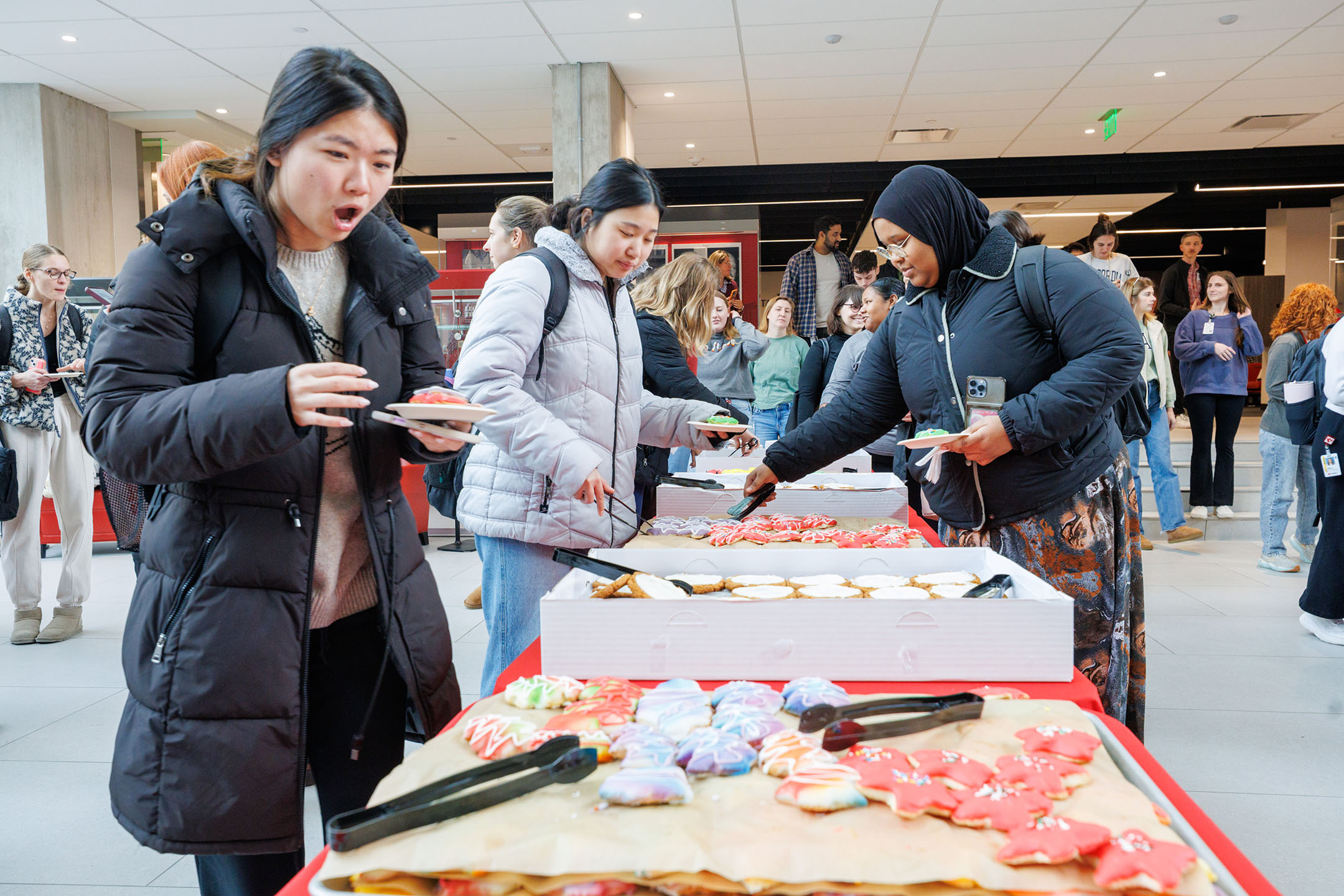 A student going through the cookie line who is amazed at the cookies