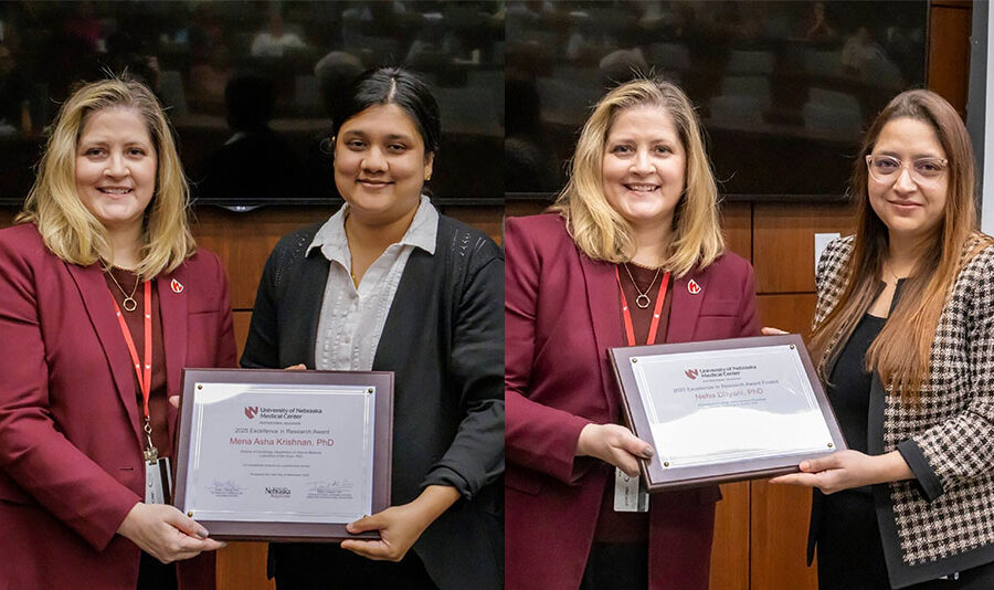 Interim Vice Chancellor for Academic Affairs Jane Meza&comma; PhD&comma; presented awards to Mena Krishnan&comma; PhD&comma; at left&comma; and Neha Dhyani&comma; PhD&comma; at the UNMC Office of Postdoctoral Education's annual event&period;