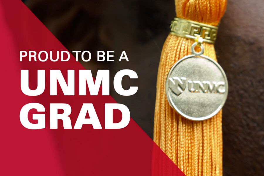 Image of a graduation tassel with the words Proud To Be A UNMC Grad