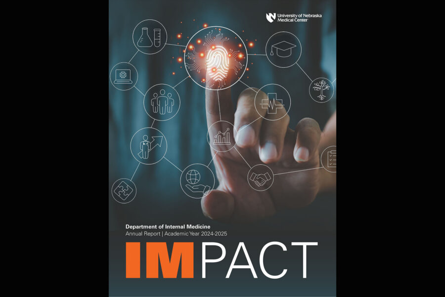 A finger accessing a touch screen with various icons and the words Department of Internal Medicine Annual Report Academic Year 2024-25 IMPACT