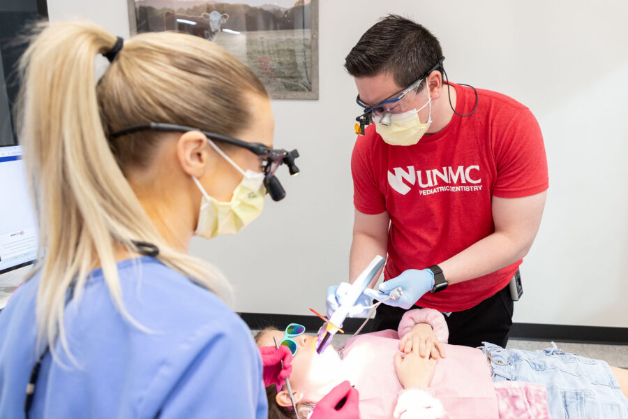 From left&comma; UNMC dentistry residents Beth Beberwyk&comma; DDS&comma; and Justin Sue&comma; DMD&comma; joined the team of providers at Children's Dental Day in York&period;