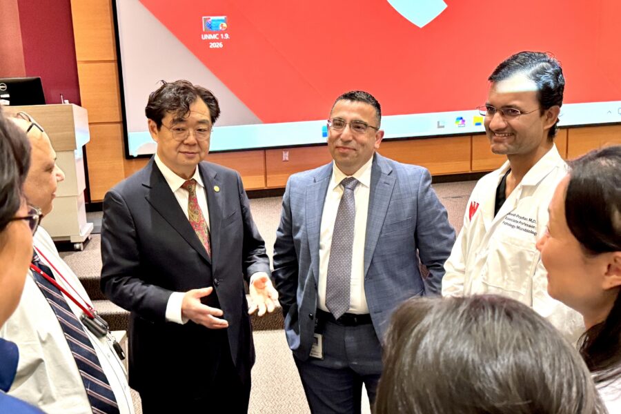 Dr&period; Jim Zhai&comma; president of the College of American Pathologists&comma; left&comma; with Dr&period; Joseph Khoury&comma; chairman of the Department of Pathology&comma; Microbiology and Immunology&comma; Dr&period; Dinesh Pradhan&comma; and others after his speech at the Durham Research Center&period;