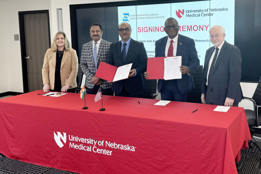 Attending the signing ceremony were&comma; from left&colon; Jane Meza&comma; PhD&comma; interim vice chancellor for academic affairs at UNMC&semi; Chandra Are&comma; MBBS&comma; UNMC's senior associate dean of graduate medical education&semi; T&period; Subramanyeshwar Rao&comma; MBBS&comma; medical director of the Basavatarakam Indo-American Cancer Hospital and Research Institute&semi; UNMC Interim Chancellor H&period; Dele Davies&comma; MD&semi; and Bradley Britigan&comma; MD&comma; dean of the UNMC College of Medicine&period;