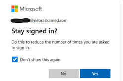 Screenshot of a Microsoft sign-in prompt asking if user wants to stay signed in to reduce sign-in frequency. The dialog includes an email partially obscured, a checked box labeled "Don't show this again," and two buttons labeled "No" and "Yes."