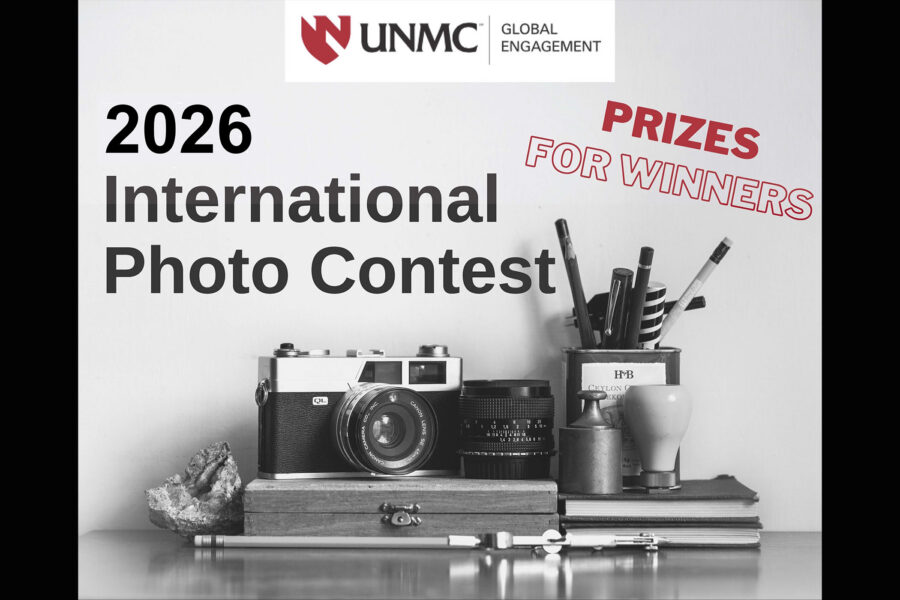 Graphic of a camera and desk items that says UNMC Office of Global Engagement 2026 International Photo Contest Prize for Winners