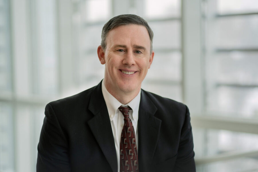 Professional headshot of TJ Pugh, MD