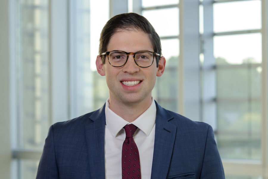Professional headshot of Daniel Pierce, MD, an assistant professor in the department of physical medicine and rehabilitation with the UNMC College of Medicine