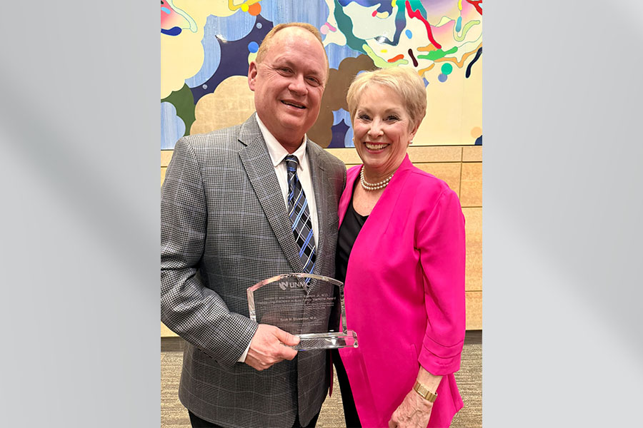 Koefoot winner Dr. Scott Ehresman and Gretchen Vondrak pose for a photo.
