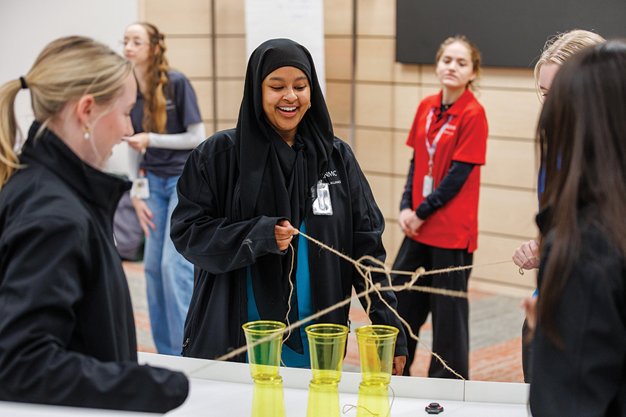 High School Alliance participants test their problem-solving skills as a team.