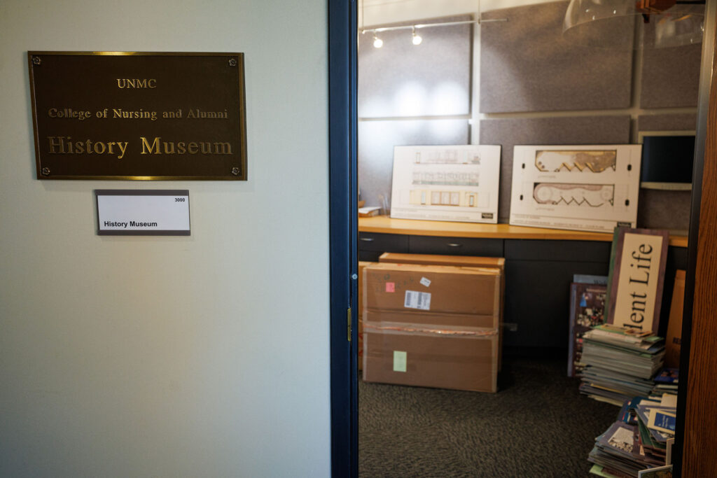 Items from the College of Nursing and alumni museum were moved to the McGoogan Library Friday Sept. 26, 2025. The archives were being donated to the library for preservation. This photo shows the entrance of the former museum space with the sign UNMC College of Nursing and Alumni History Museum.
