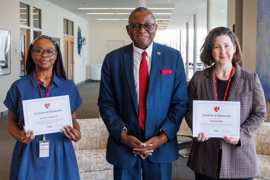 From left are Jacqueline Hankins-Berry&comma; community engagement administrative associate with the Munroe-Meyer Institute&comma; UNMC Interim Chancellor H&period; Dele Davies&comma; MD&comma; and Maria Ball&comma; communications specialist with the division of internal medicine&period;