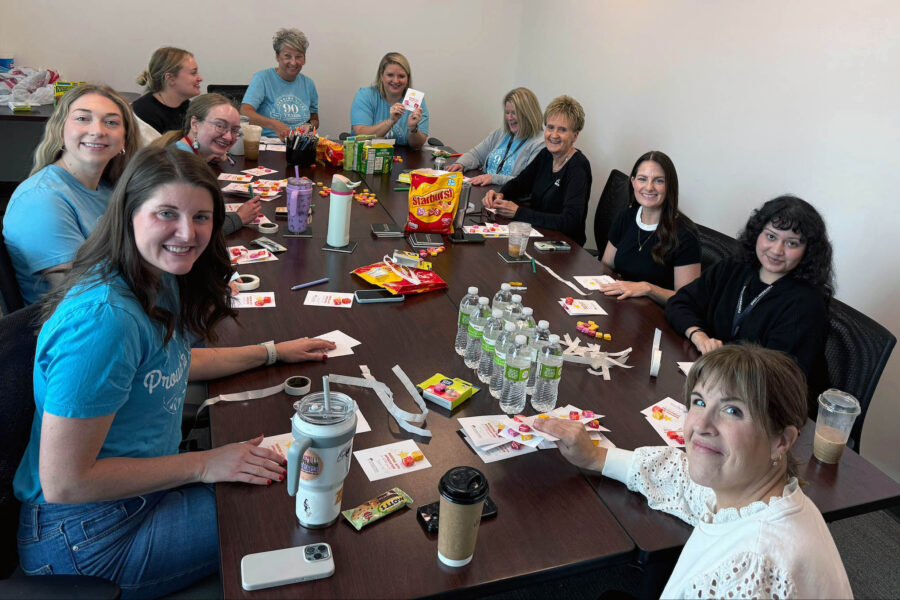 University of Nebraska Foundation employees participated in a Day of Service on each campus of the University of Nebraska on May 29&comma; 2026&period; The volunteer event commemorated the 90th anniversary of the foundation&comma; which was established on June 3&comma; 1936&period; Here&comma; a group of foundation employees makes Candygrams for the valets and environmental services staff at the Fred & Pamela Buffett Cancer Center at UNMC and Nebraska Medicine in Omaha&period;