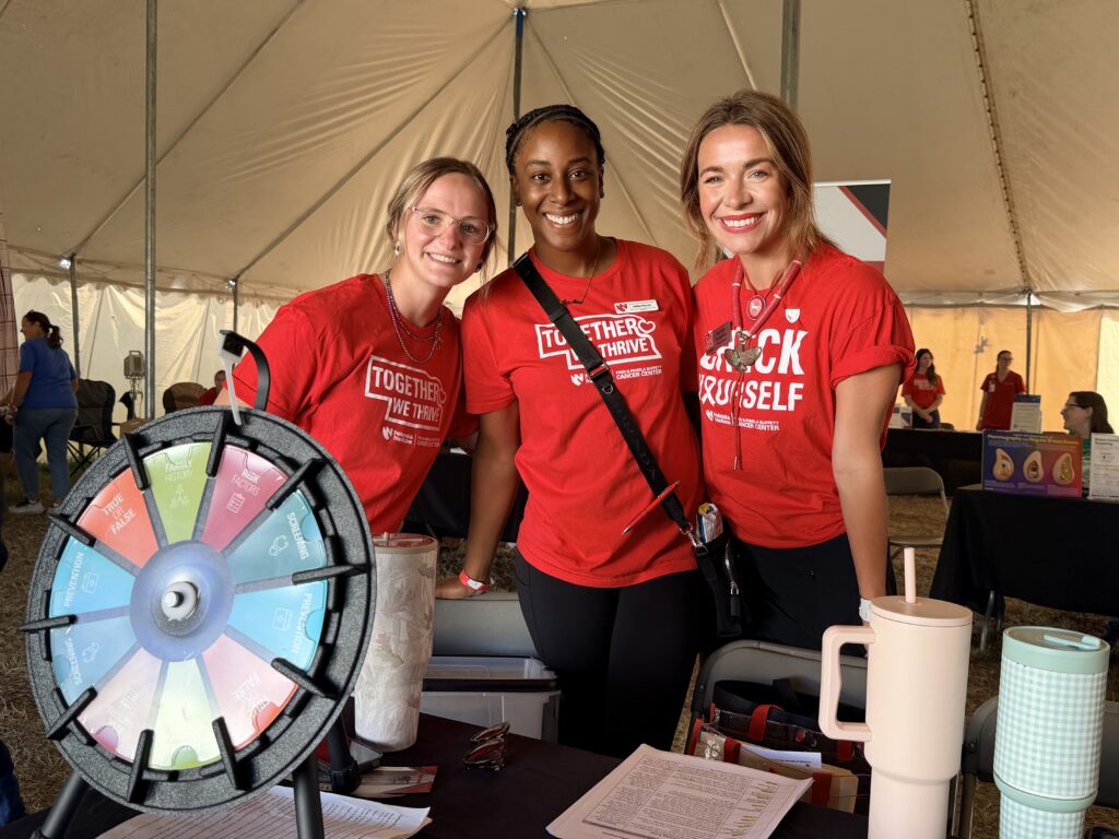 Cancer center staff at an informational table